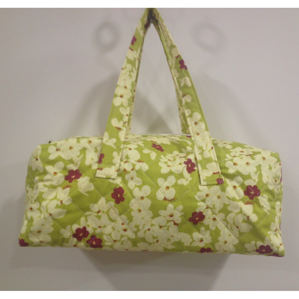 Bolsa de labores verde con flores